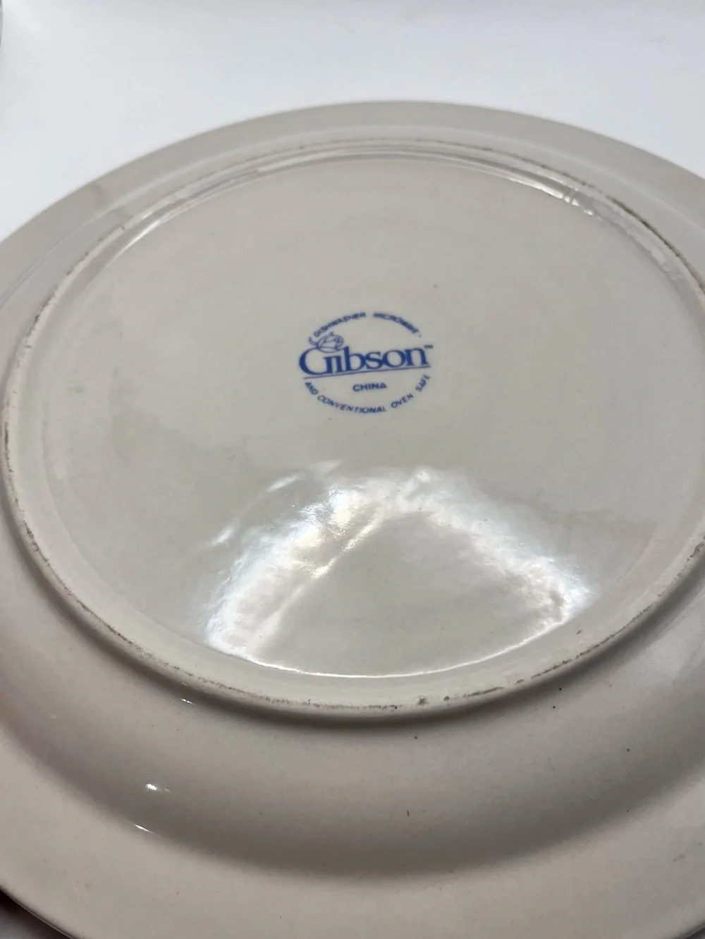 Gibson Cream Dinner Plate with Green Check Rim and Fruit Basket